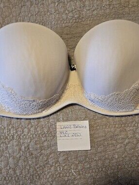 Cacique/Lane Bryant multi-lot size 44c .Black and white padded strapless bras.